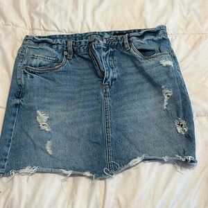 Ripped denim skirt